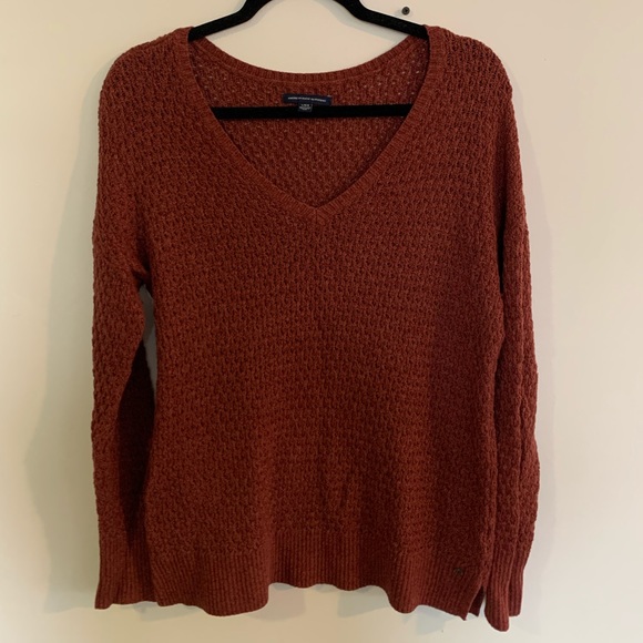 Maroon /rust coloured v neck American eagle loose knitted sweater. - Picture 1 of 3
